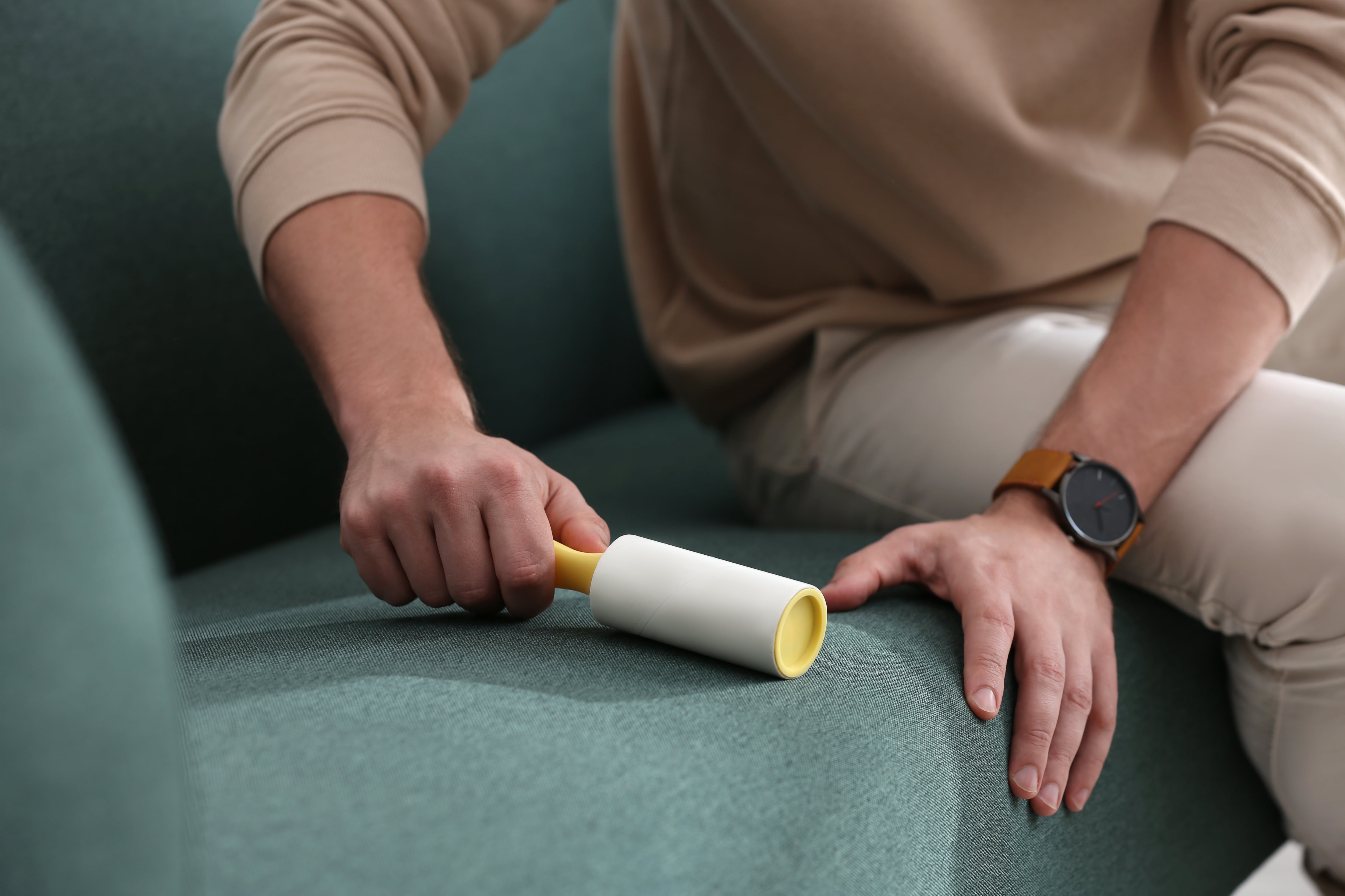 Person using lint roller