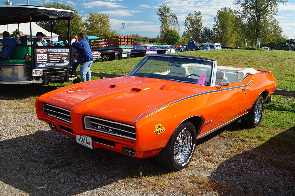 Close-up photo of a Orange 1969 Pontiac GTO The Judge Convertible