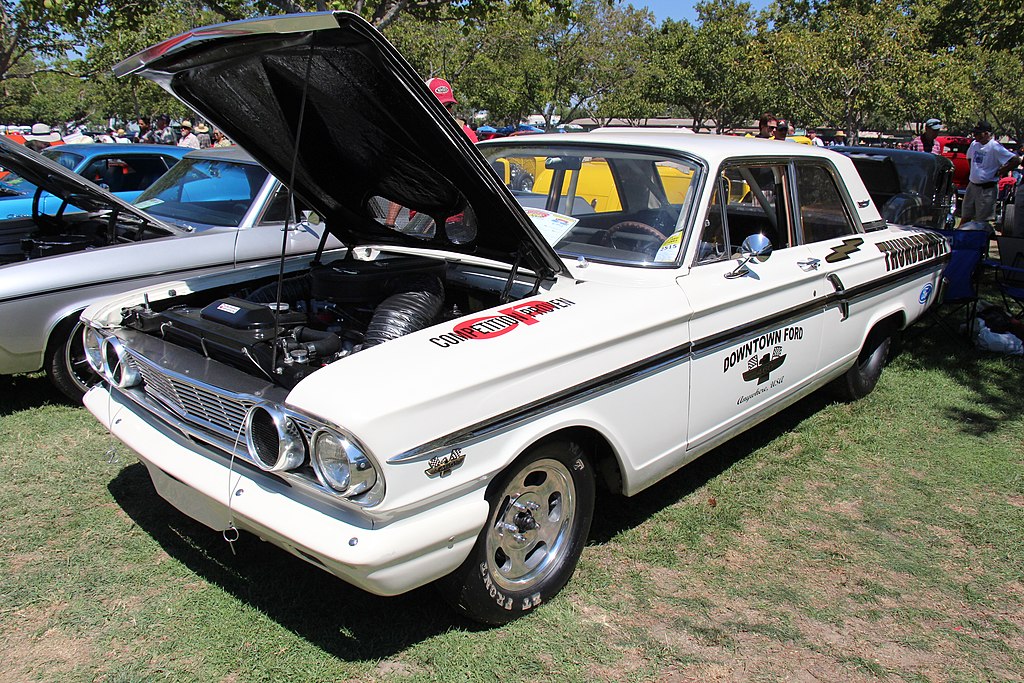 Close-up photo of a white 1964 Ford Fairlane Thunderbolt 2 door Sedan