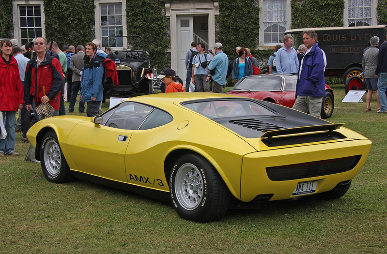 Close-up photo of a Yellow 1970 AMC AMX/3