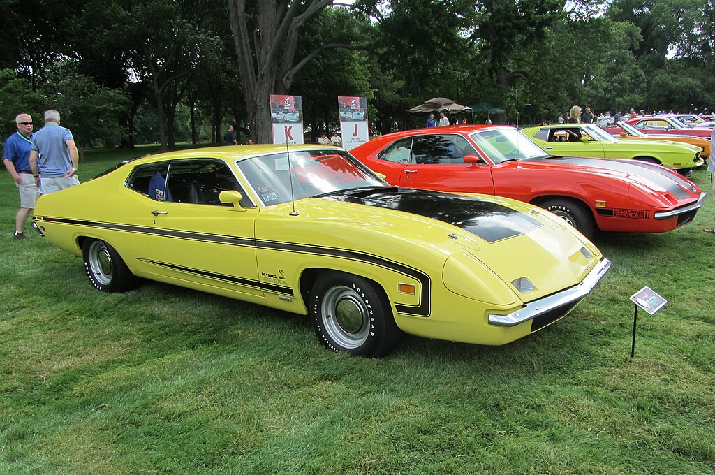 Close-up photo of a Yellow 1970 Ford Torino King Cobra