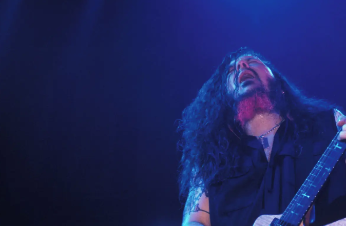 Photo of Dimebag DARRELL and PANTERA performing on stage