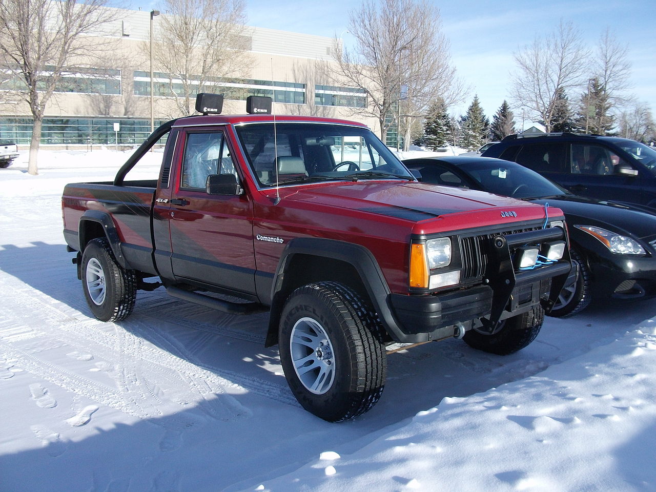 Dark Red Jeep Comanche Eliminator.