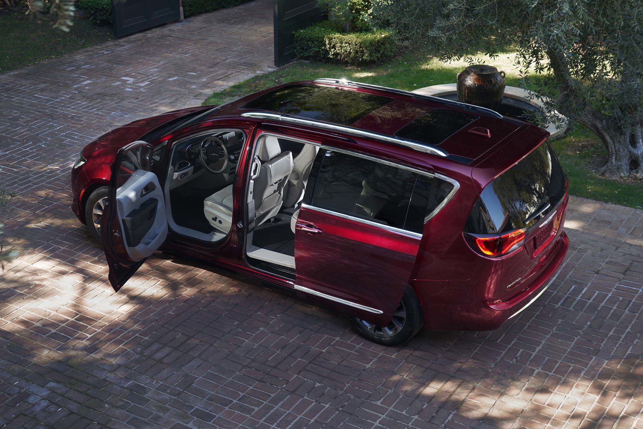Red Chrysler Pacifica: Stow ‘N Go doors opened