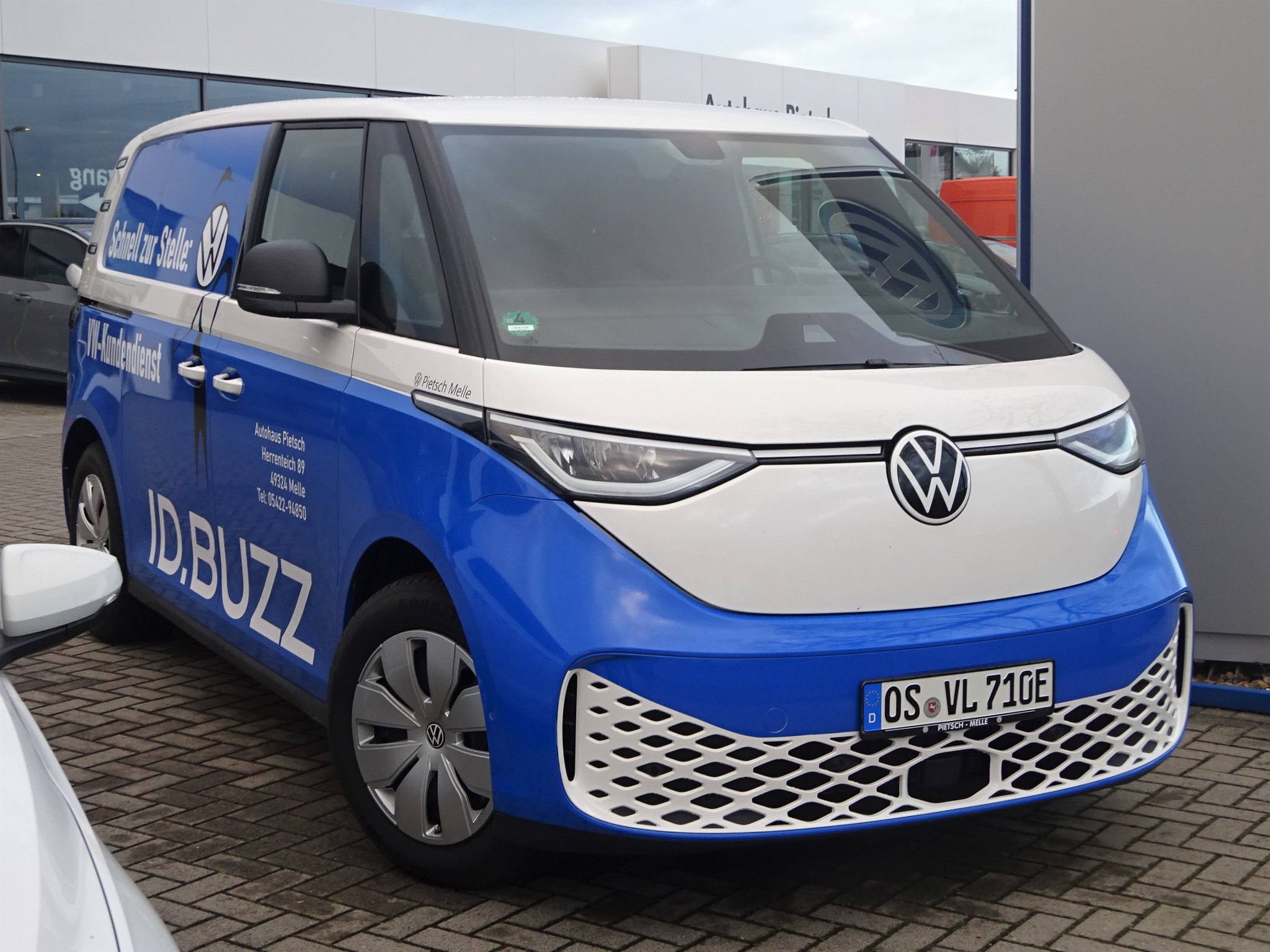 Image of blue and white Volkswagen ID. Buzz