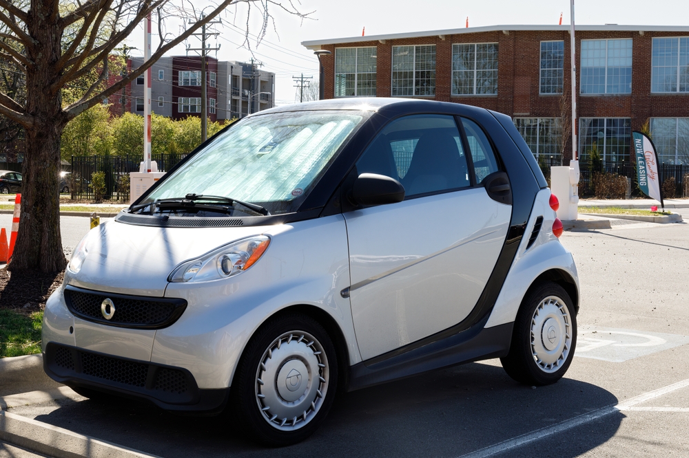 Smart Car in parking lot.
