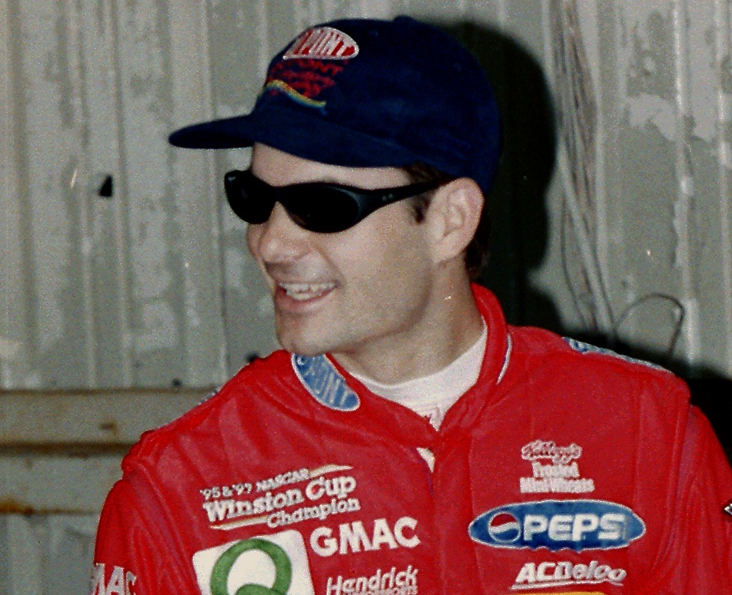 NASCAR racer Jeff Gordon in a red jacket