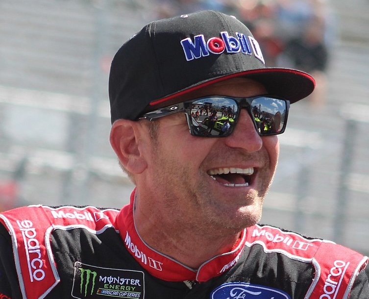 NASCAR racer Clint Bowyer wearing a black cap