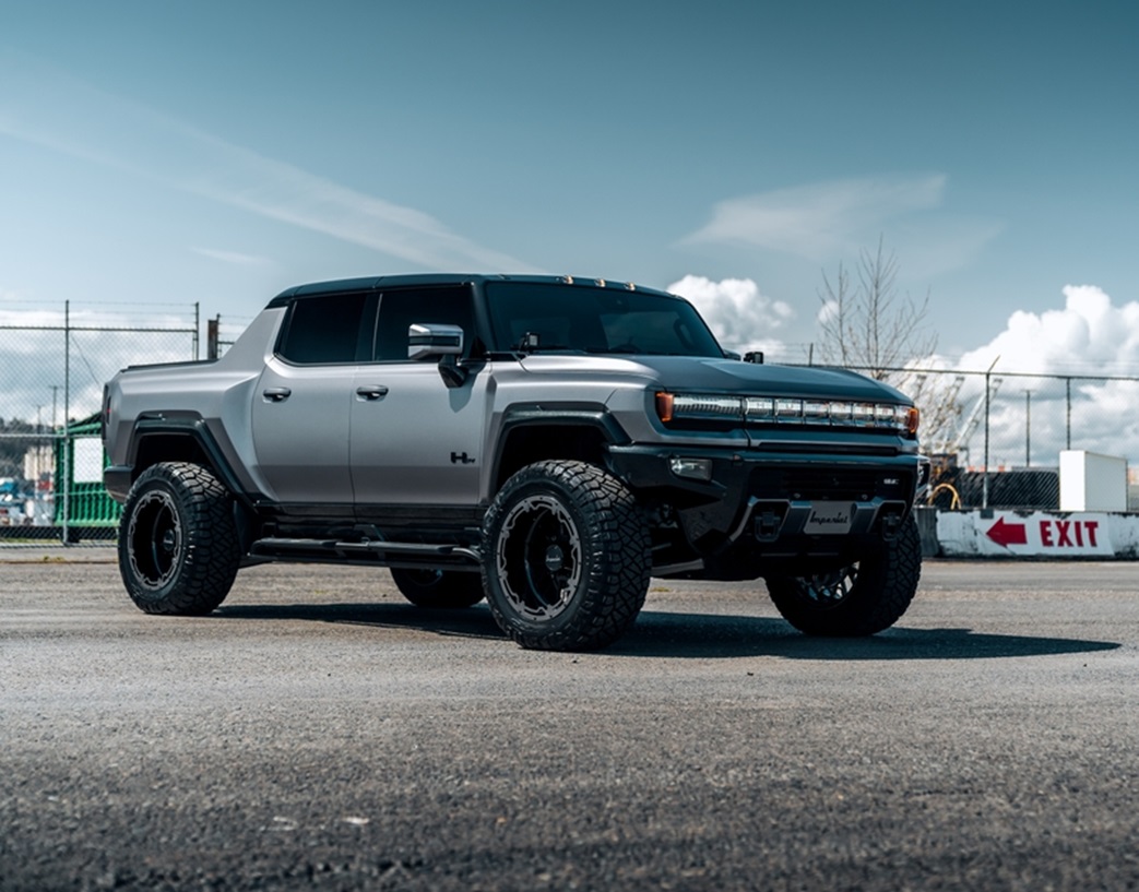 2023 Hummer EV parked at an angle with blue skies overhead