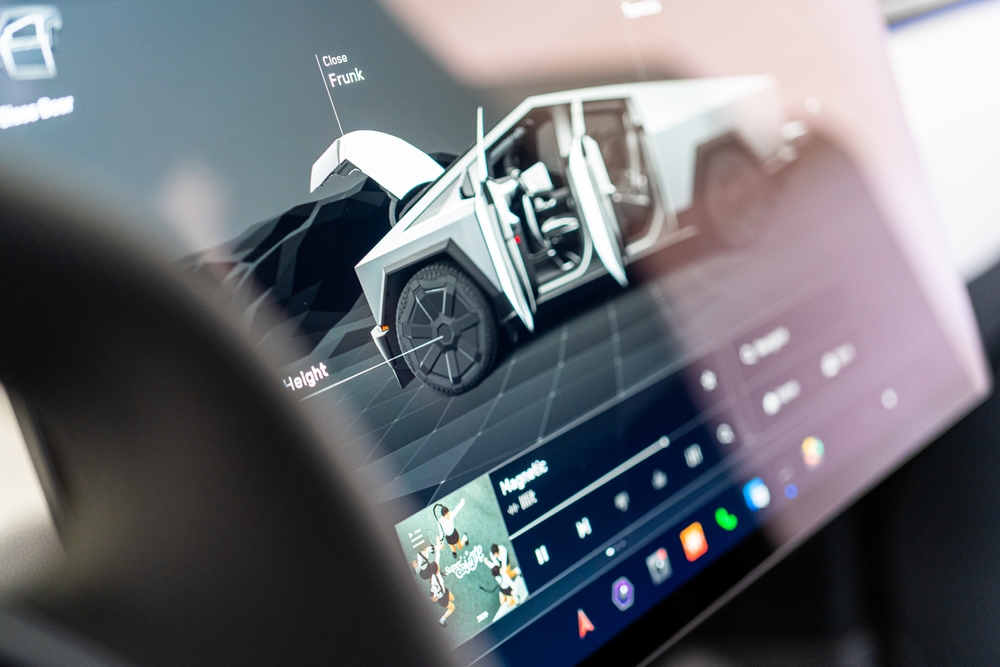 The interior of a Tesla Cybertruck showcasing its advanced touchscreen display