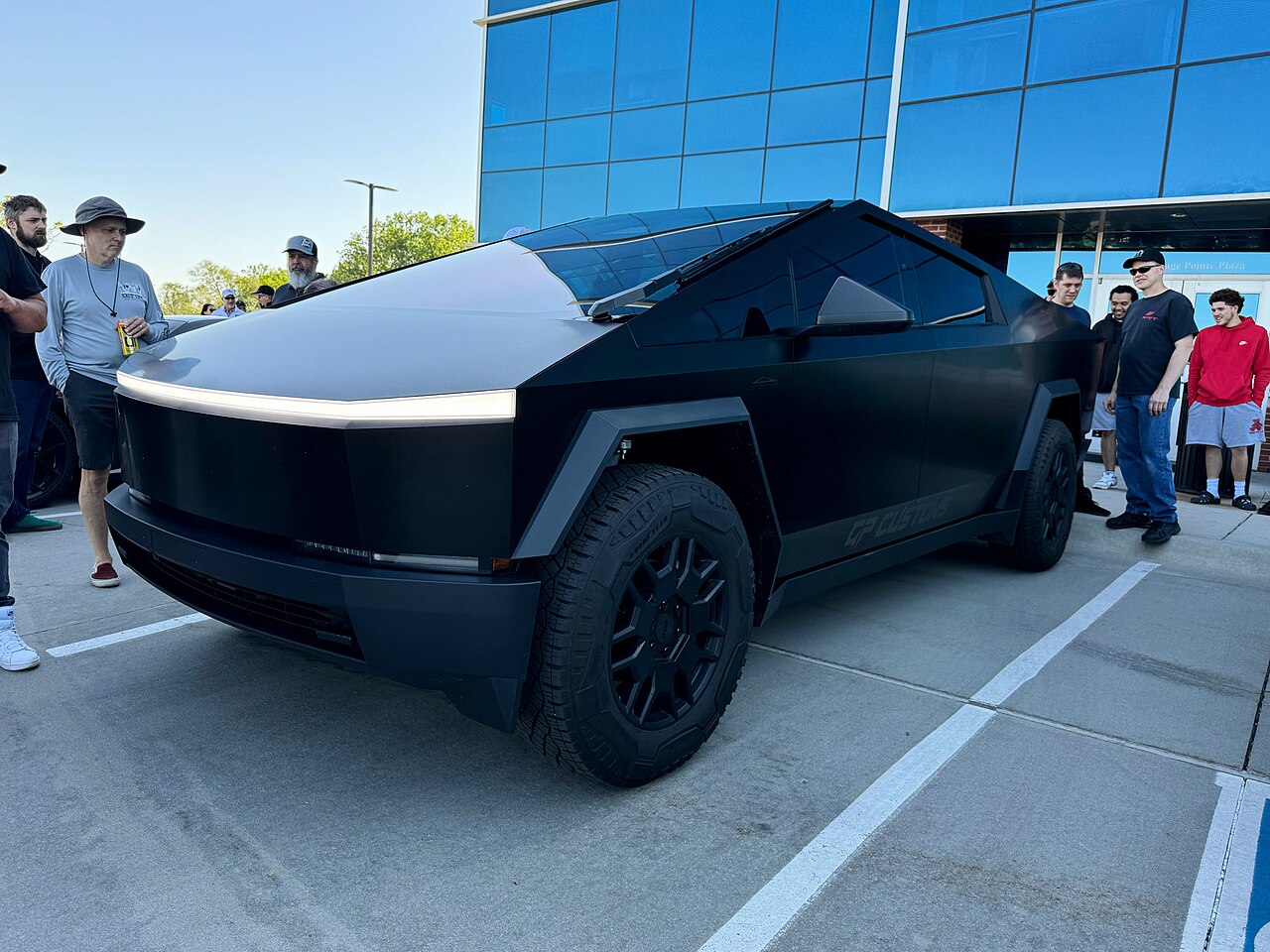 Black Tesla Cybertruck on the street.