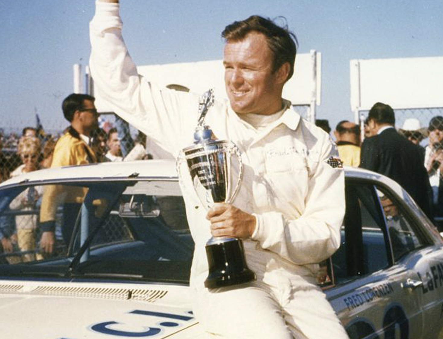  Fred Lorenzen after winning his Daytona 500 qualifying race at Daytona International Speedway. Lorenzen ran the entire distance on one tank of gas.