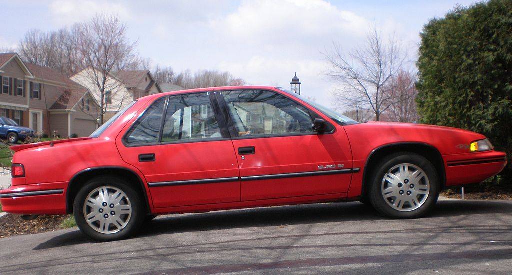 Close-up photo of a Red 1991 Chevrolet Lumina