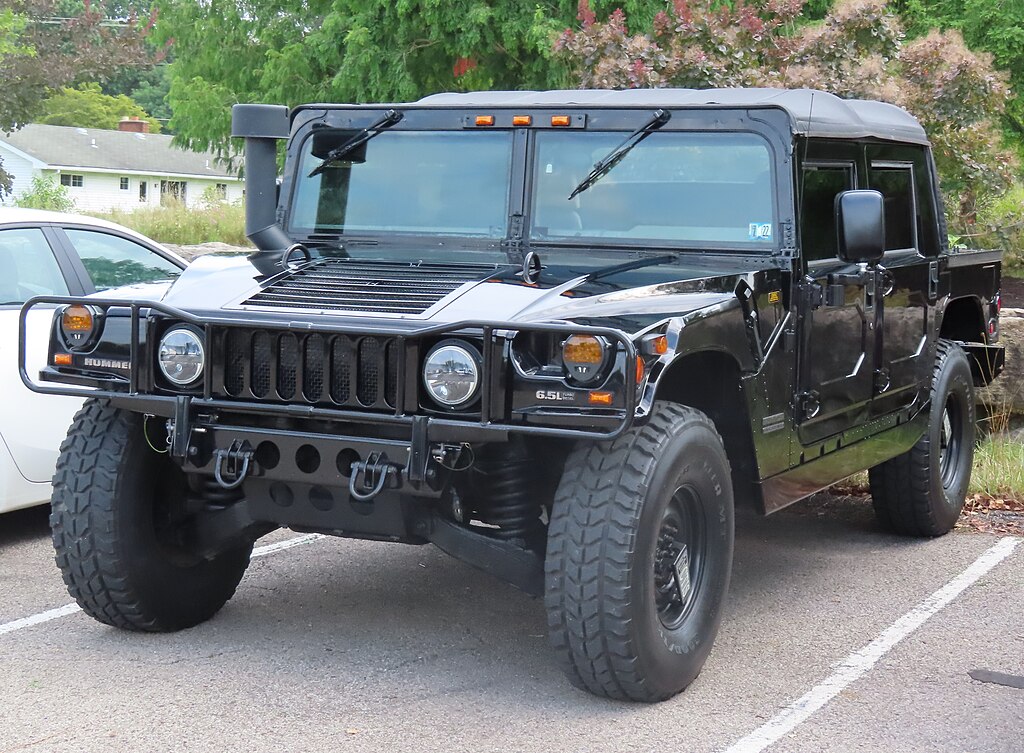 1994-2000 AM General Hummer soft top crew cab pickup photographed in Ellwood City, Pennsylvania.