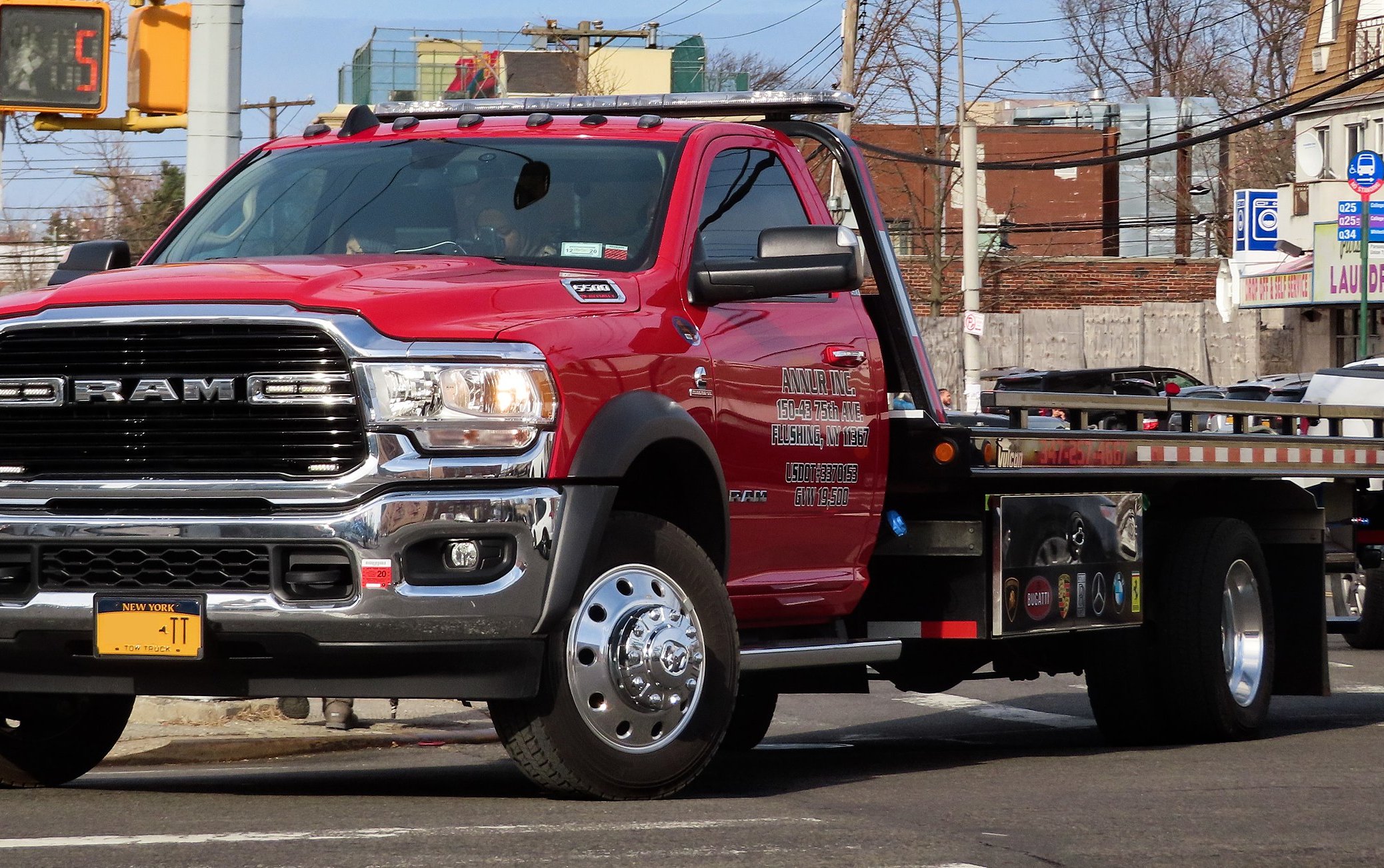 A Red  2019 Dodge Ram 5500 tow truck