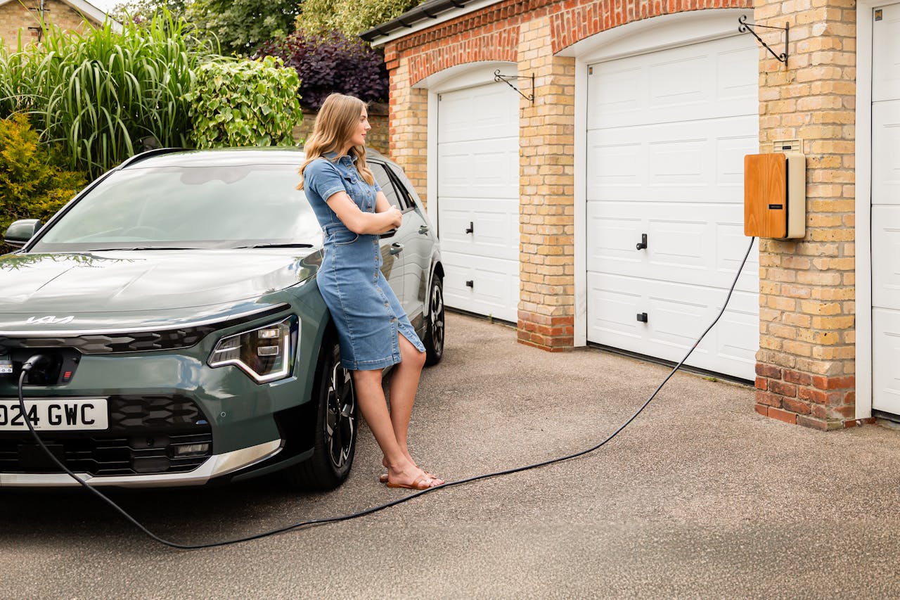 Young lady with an Andersen home electric vehicle charge point