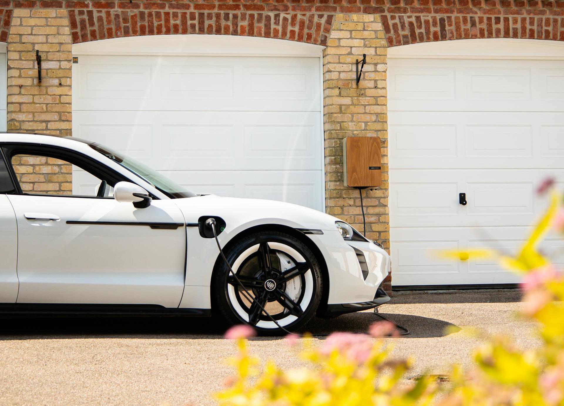 White Electric Sports Car Charging