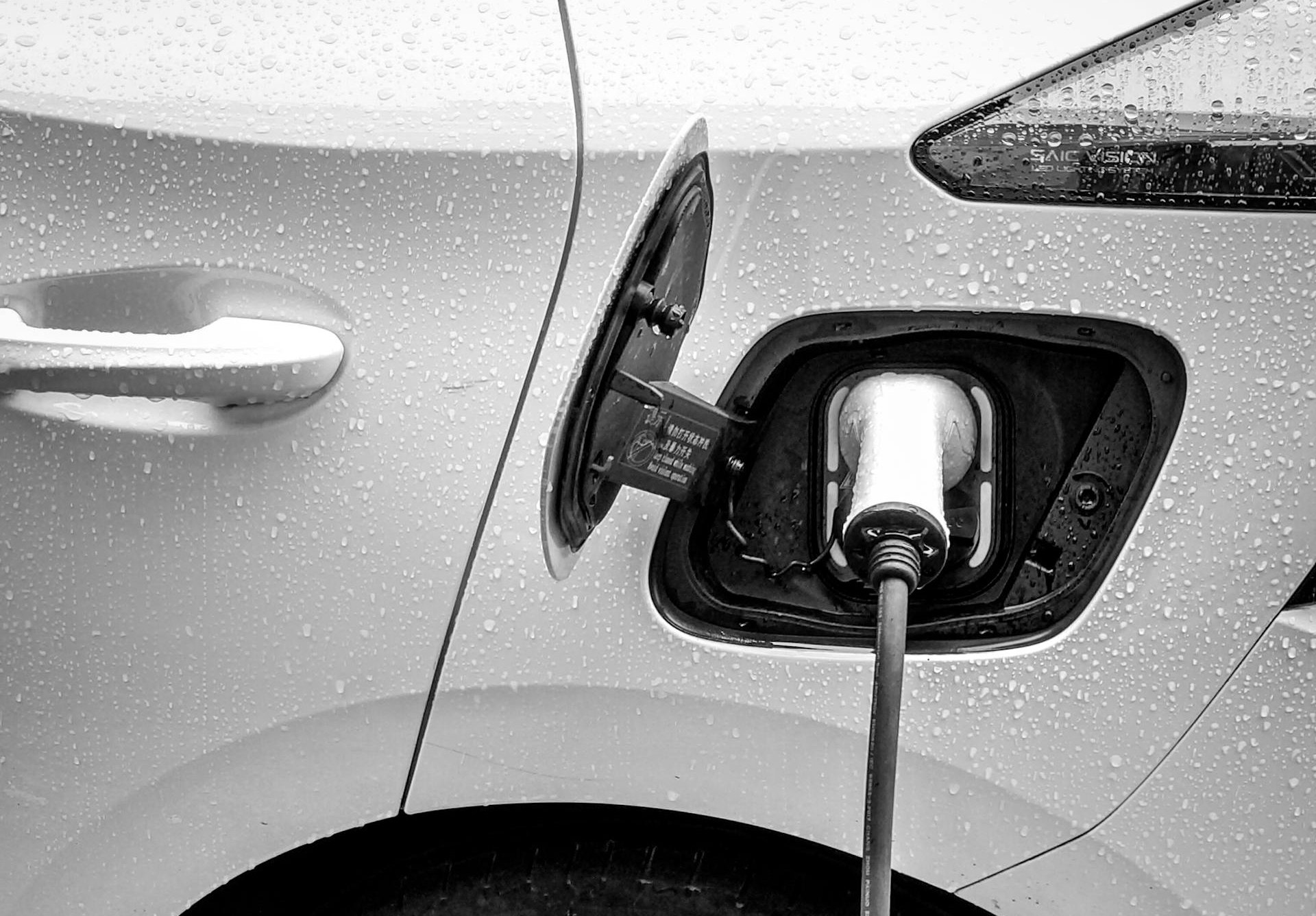 A black and white photo of a car