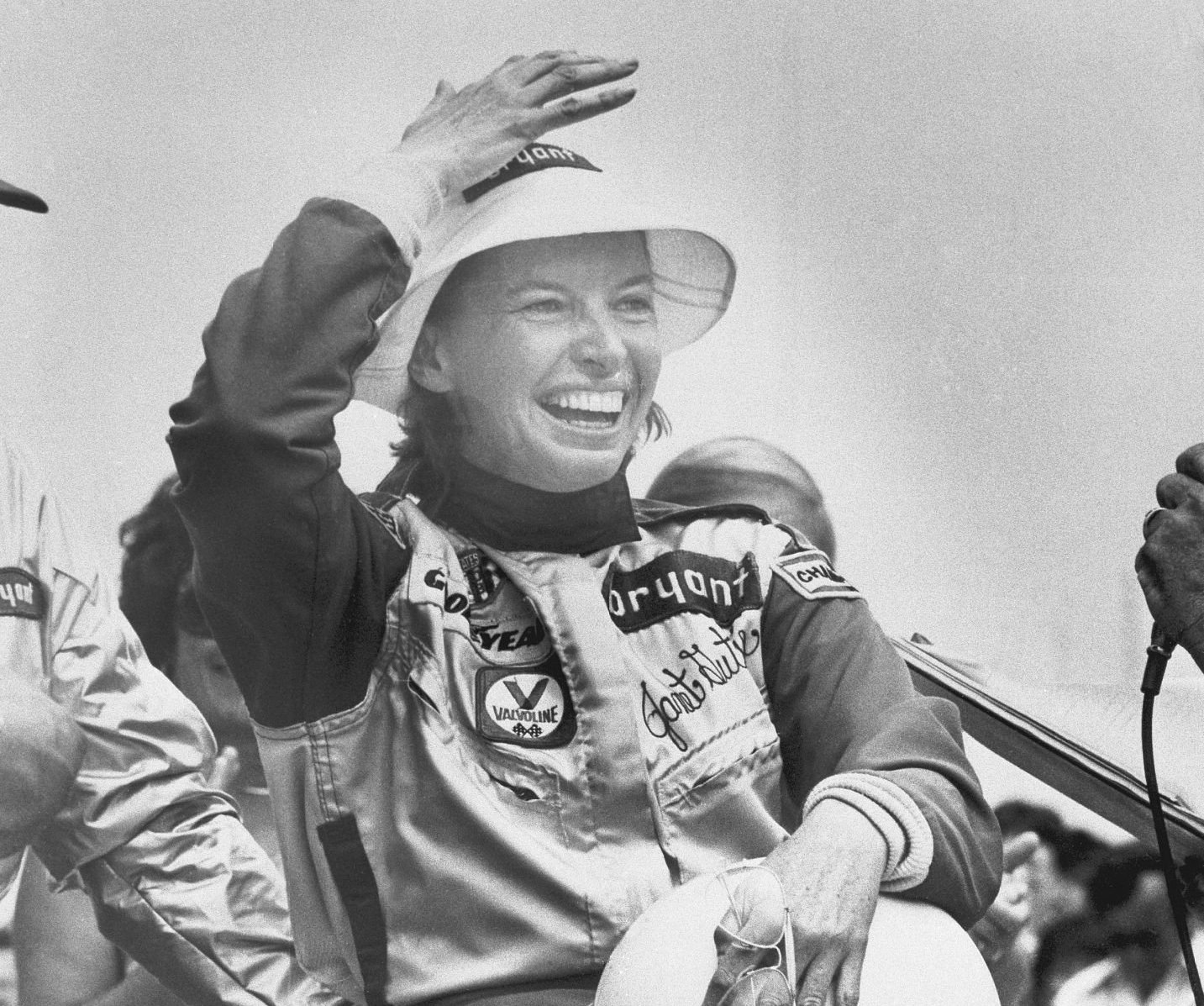 Janet Guthrie Laughing in Racecar