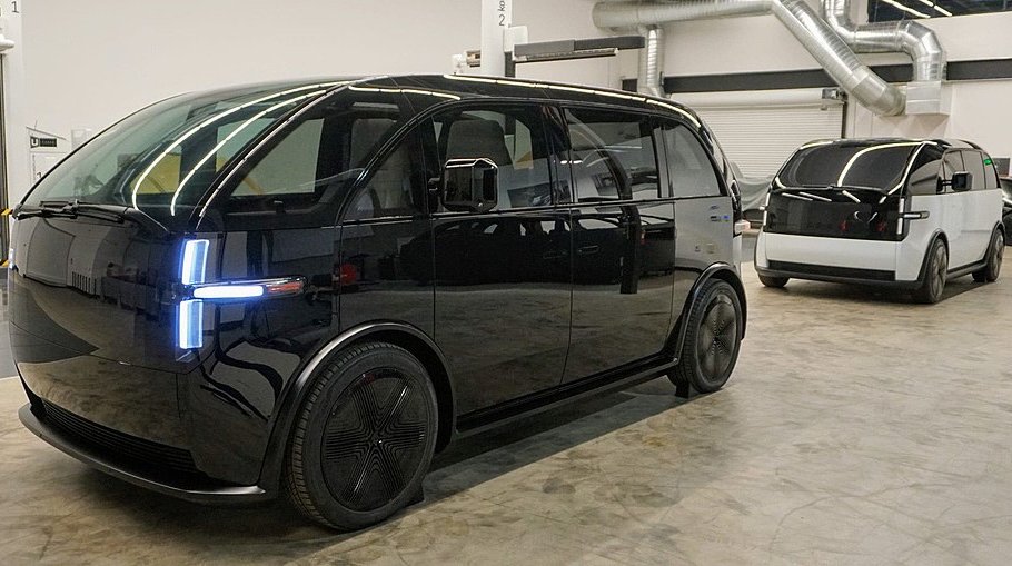 A close-up photo of a Canoo electric van car on display at an exhibition