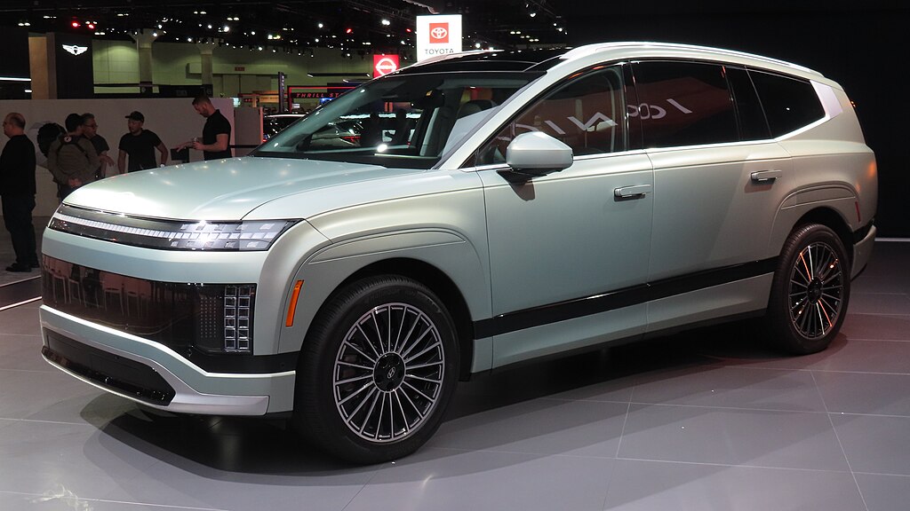 A close-up photo of a Silver Hyundai Ioniq 9 car on display at an exhibition