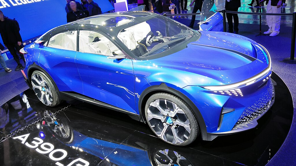 A close-up photo of a blue  Alpine A390 car on display at an exhibition