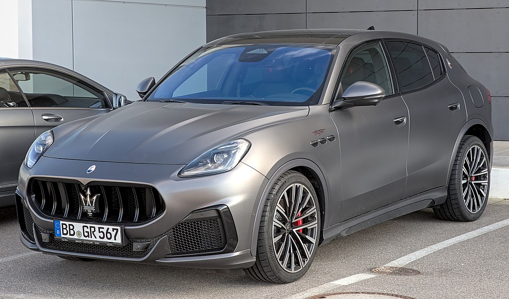 A close-up photo of a Maserati Grecale Trofeo car parked in a parking lot