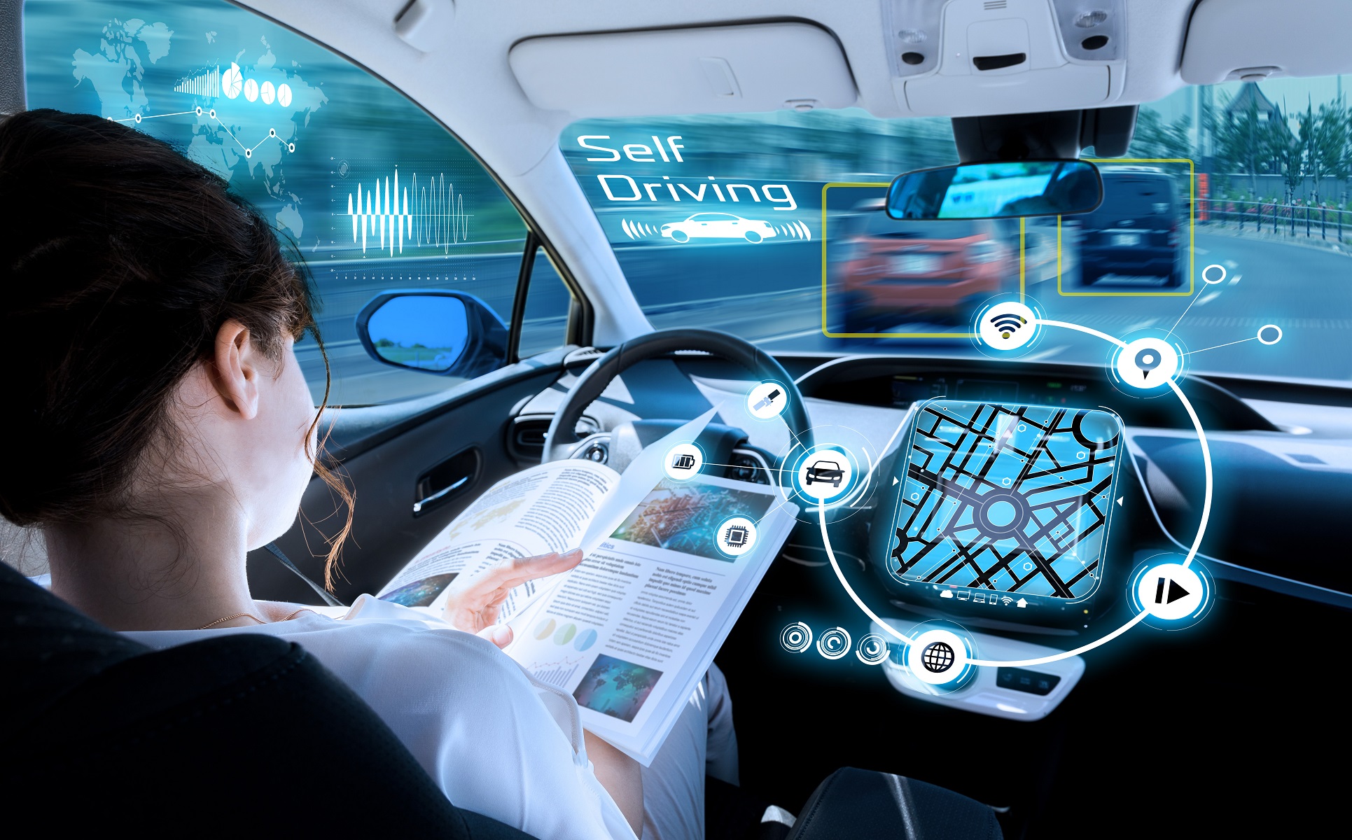 Young woman reading a book in a autonomous car.