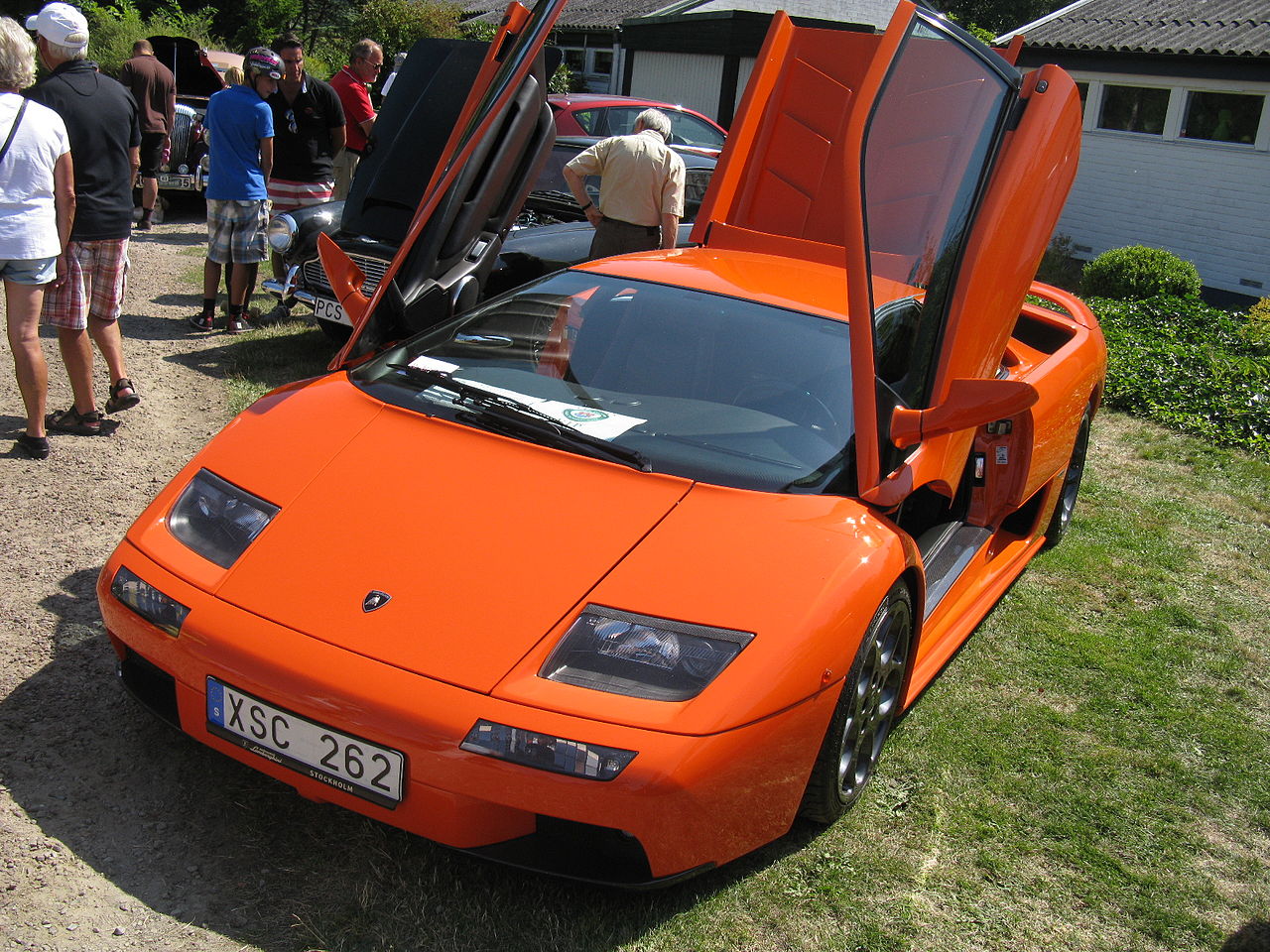 Orange Lamborghini Diablo with open doors - 2013