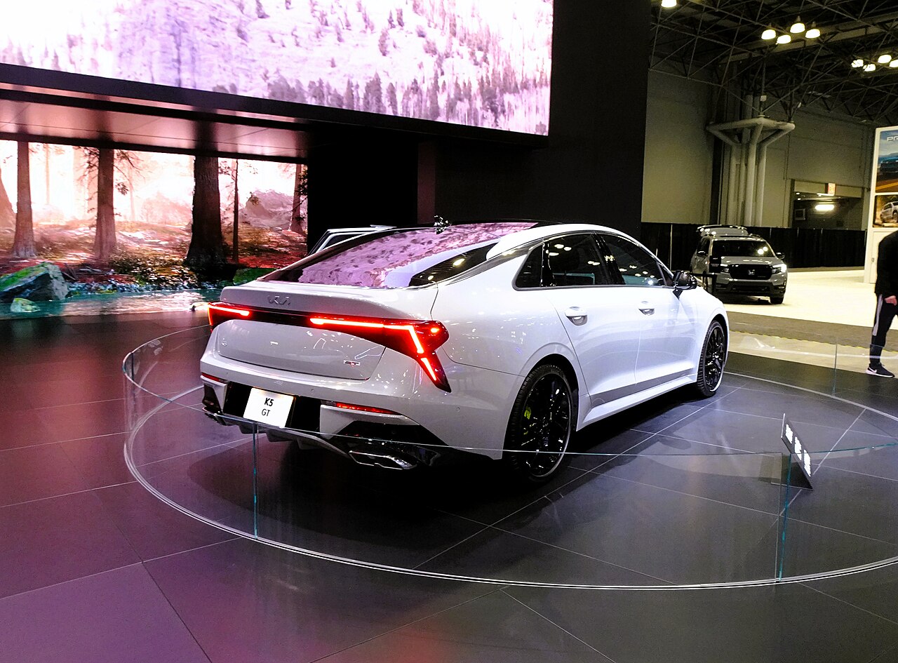 White 2024 Kia K5 - back view.