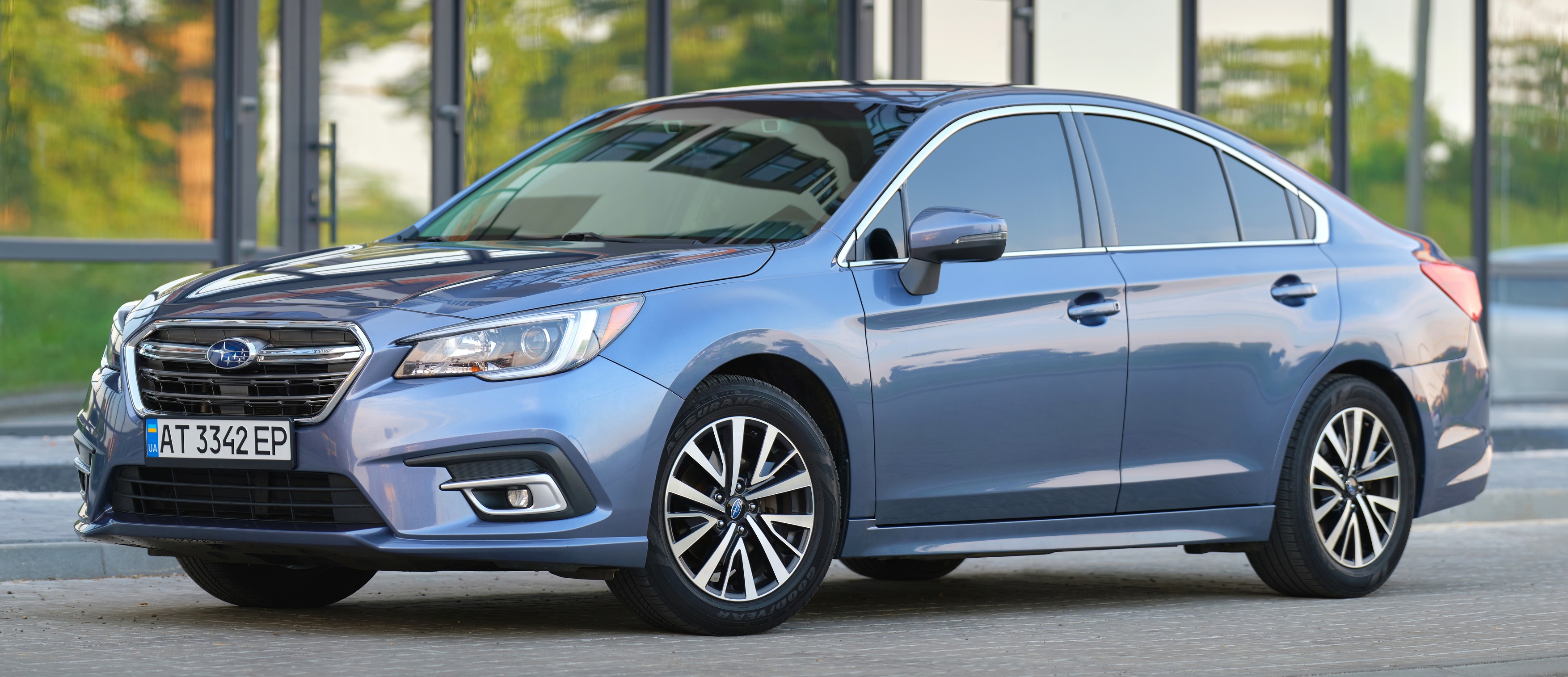 Front view of new Subaru Legacy car parked on city street side. Kyiv, Ukraine