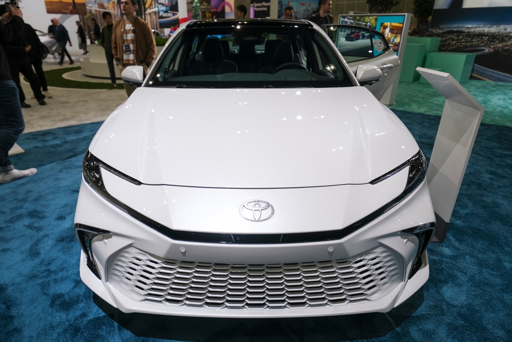 A new Toyota All-Electrified 2025 Camry vehicle is displayed at the LA Auto Show