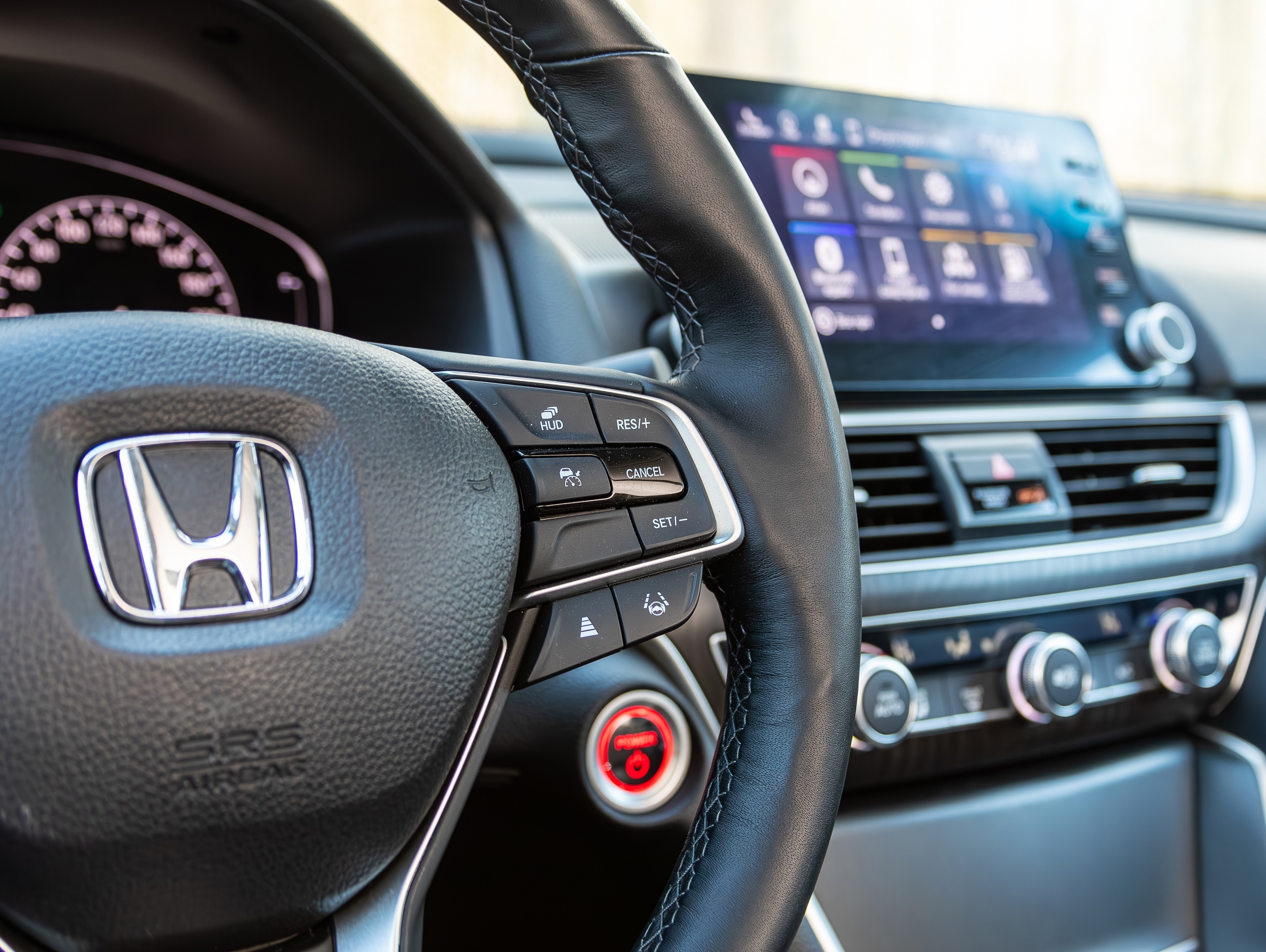 2024: Honda Accord, black steering wheel with multifunction buttons for quick control, close-up in the car.