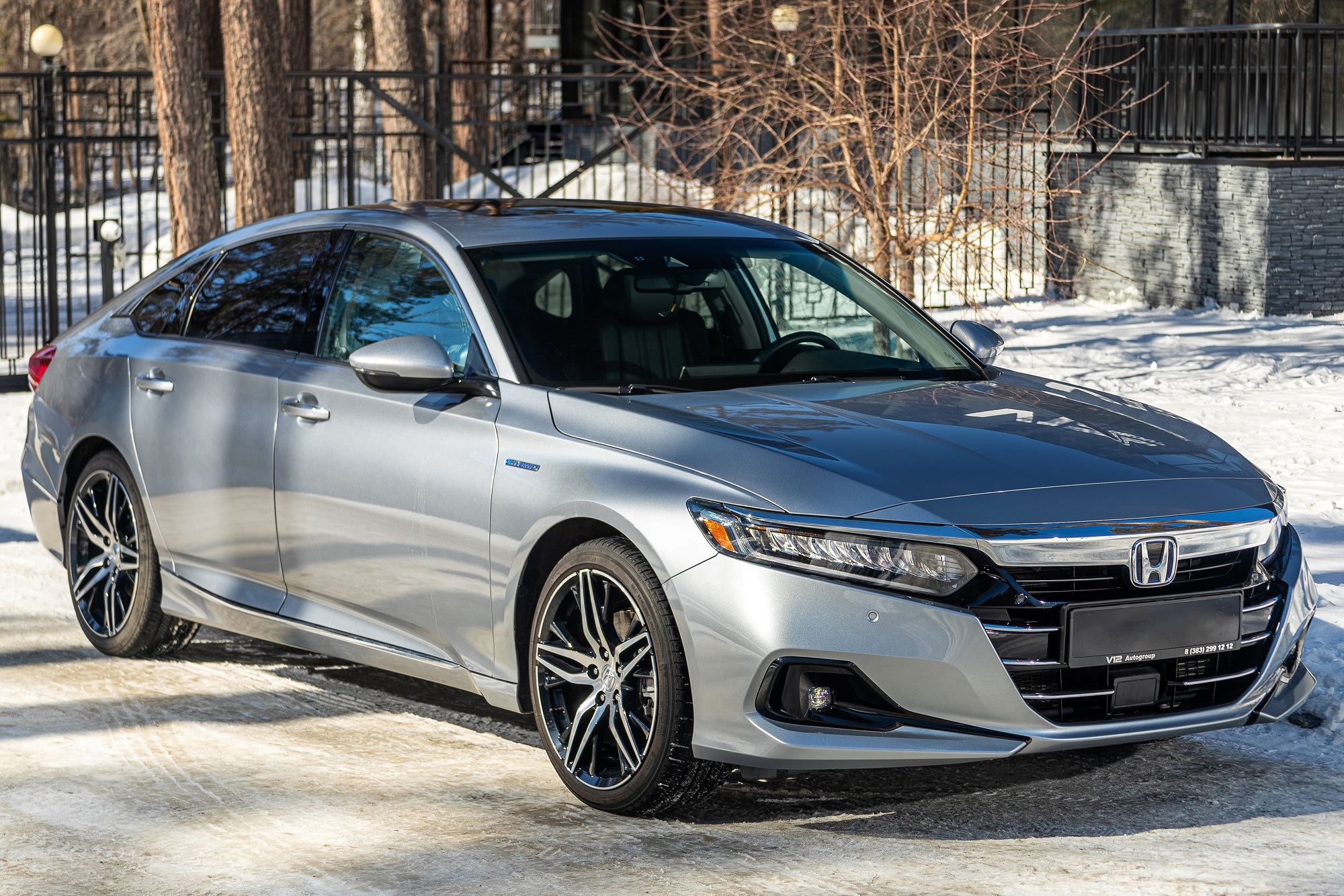 2024: silver Honda Accord parked outside.