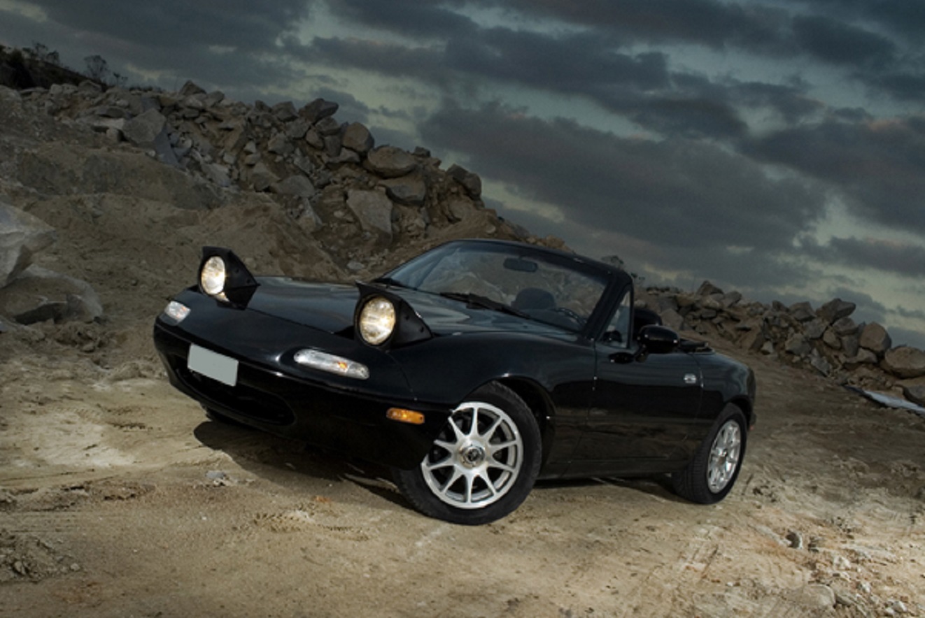 Black Mazda MX-5 Miata outside.
