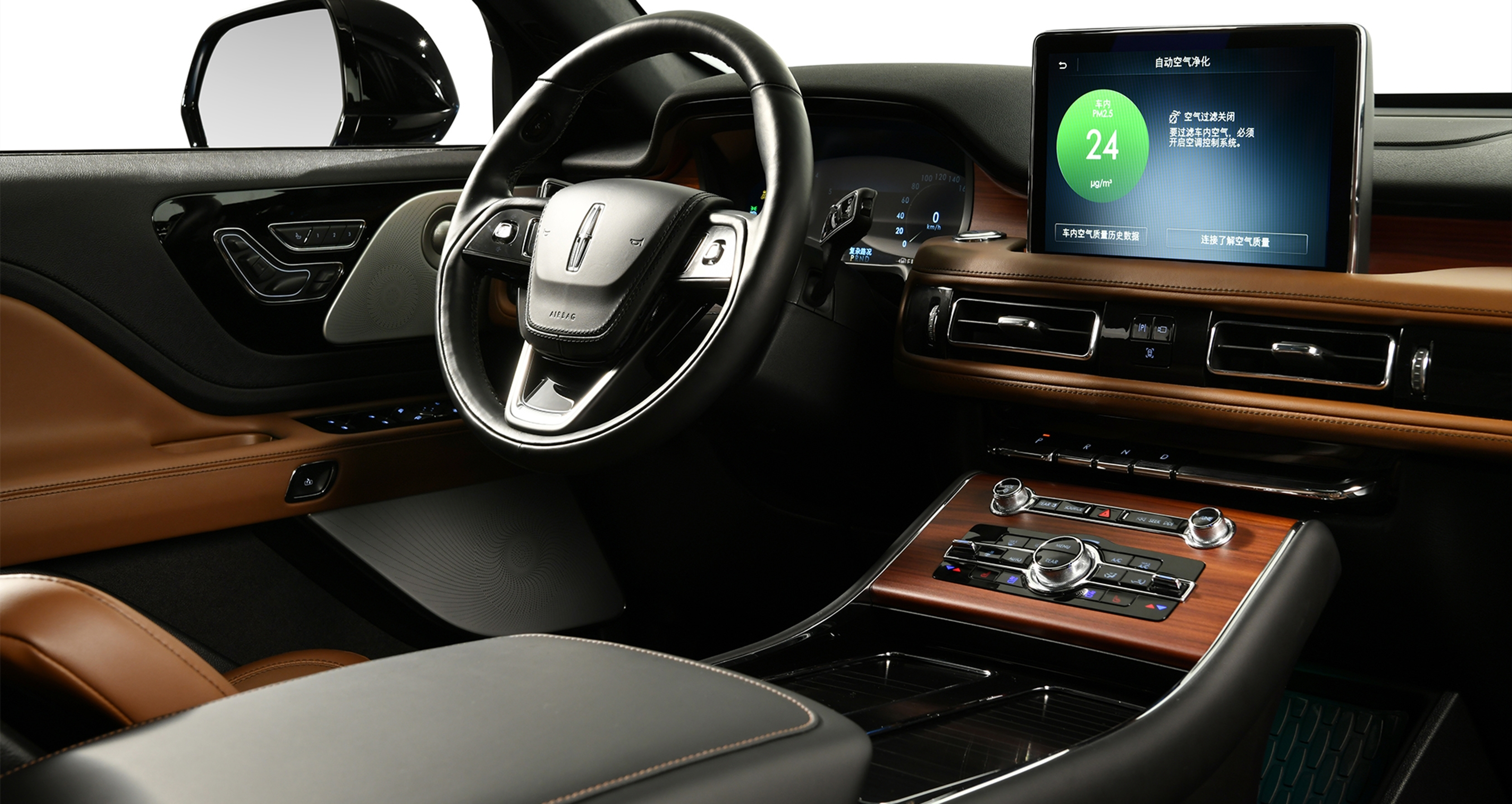 The cab of A blue Lincoln Aviator hybrid SUV