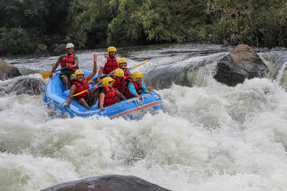Action captured in motion, river rafting in white waters