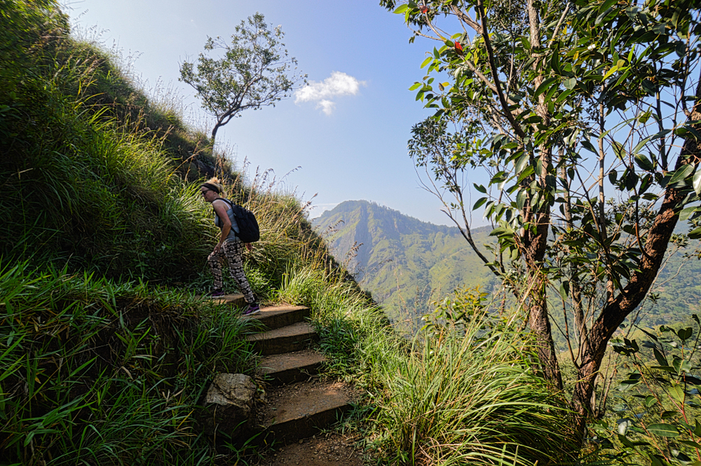 image of a woman hiking in sri lanka
