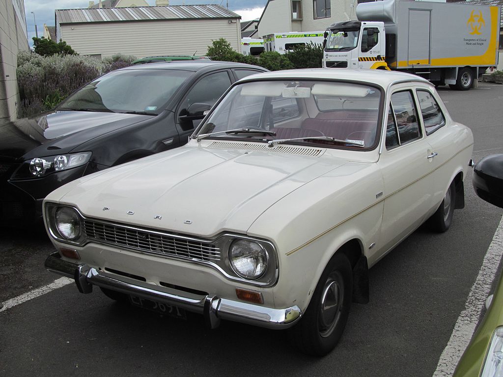 Close Up Photo of White 1968 Ford Escort 1100 Deluxe