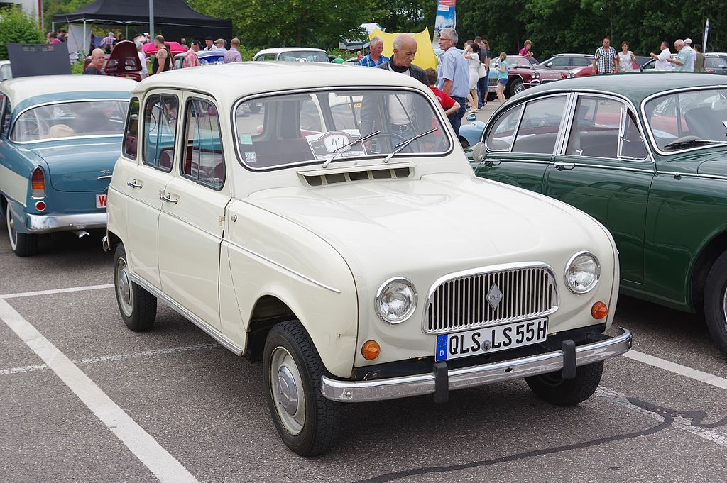 Close Up Photo of white 1961–1967 Renault 4.
