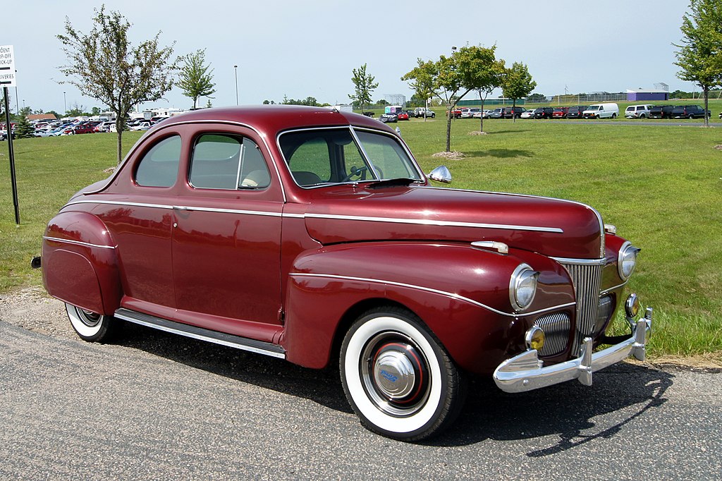 Red 41 Ford Coupe displayed on exhibition