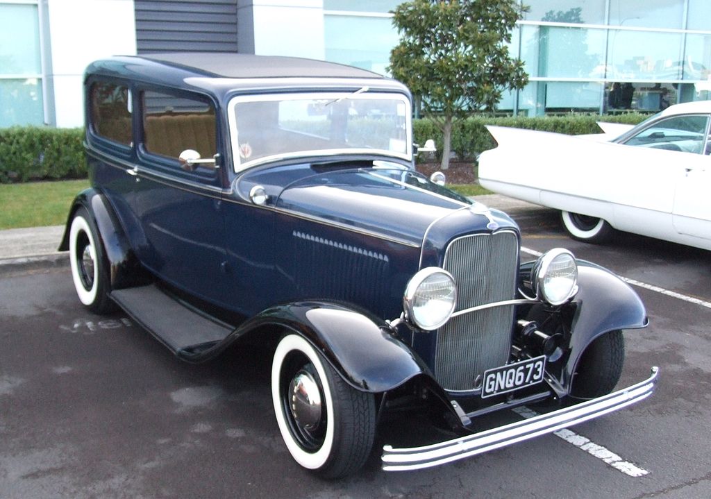 Blue 1932 Ford V8 on a parking lot