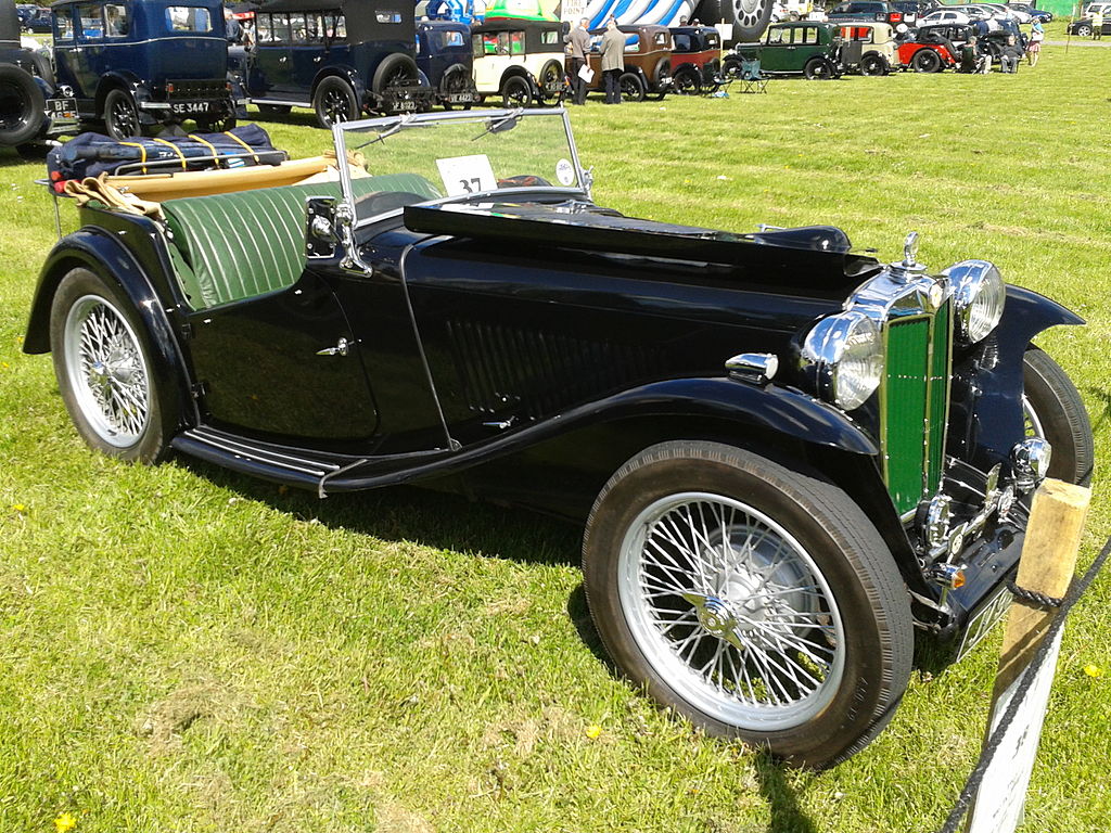 Black 1946 MG TC parked on grass