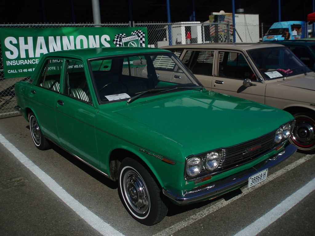 Close Up Photo of Green 1968 Datsun 510