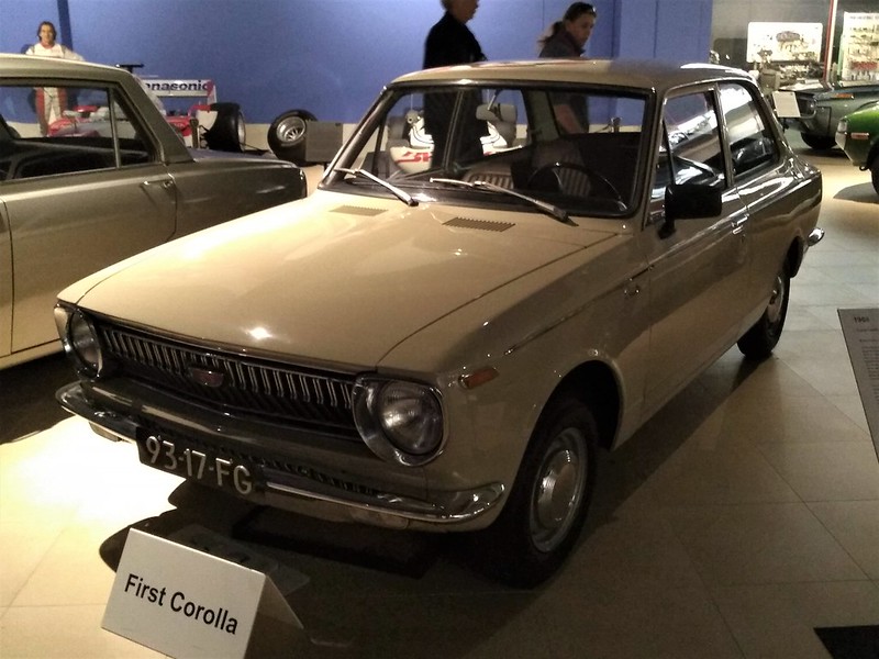 Close Up Photo of White 1968 Toyota Corolla