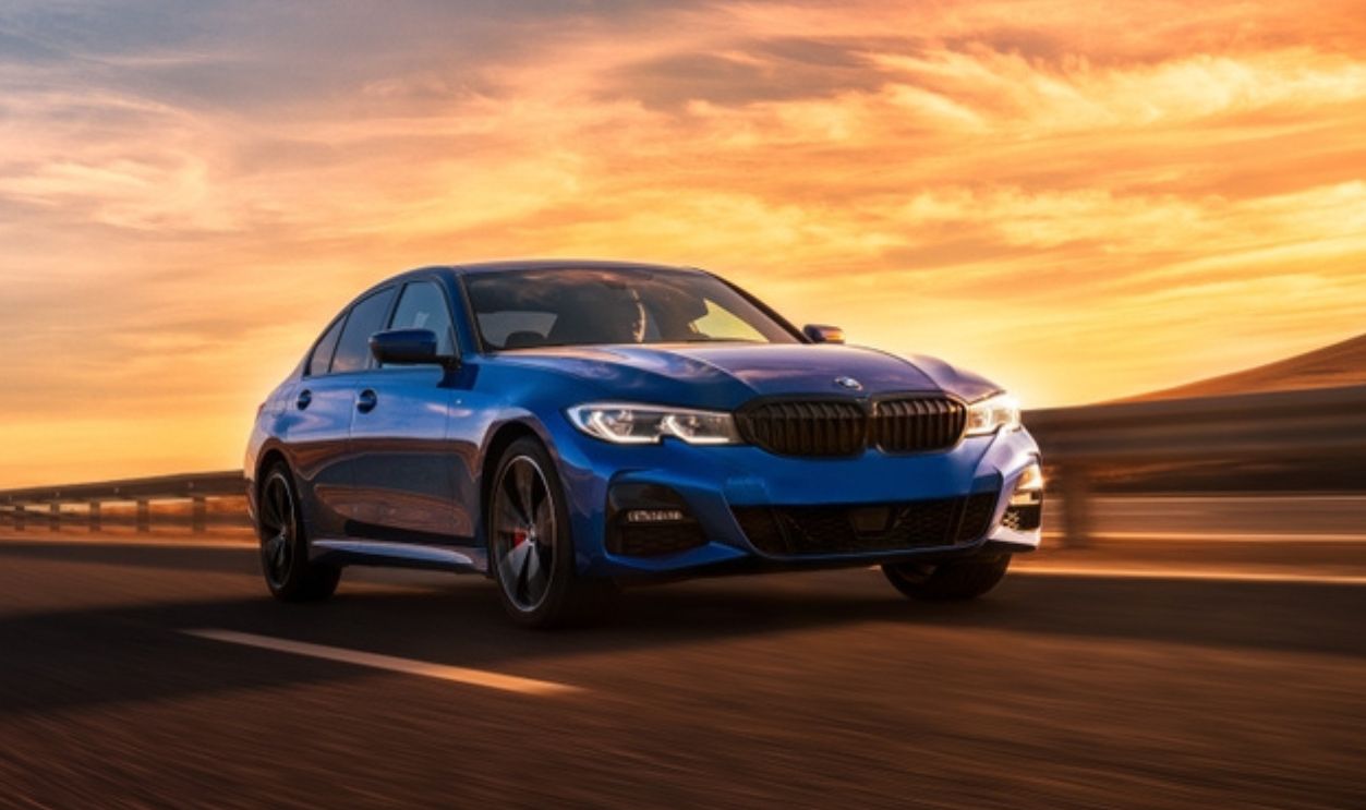 2023 blue BMW 320 with M Performance package