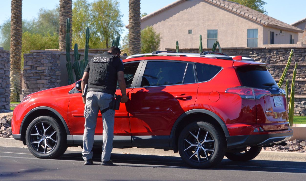 Red car stopped by police