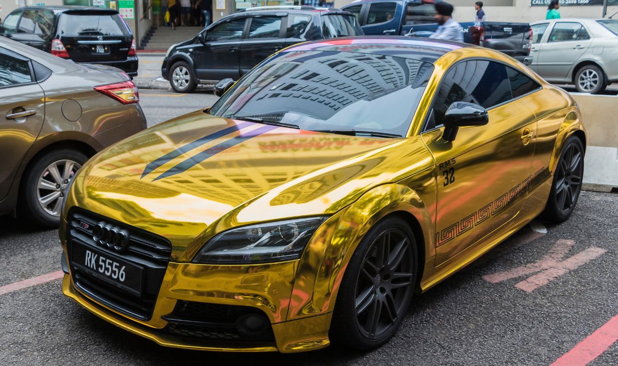 Unique and an eye-catcher! Golden luxury sports car in Kuala
