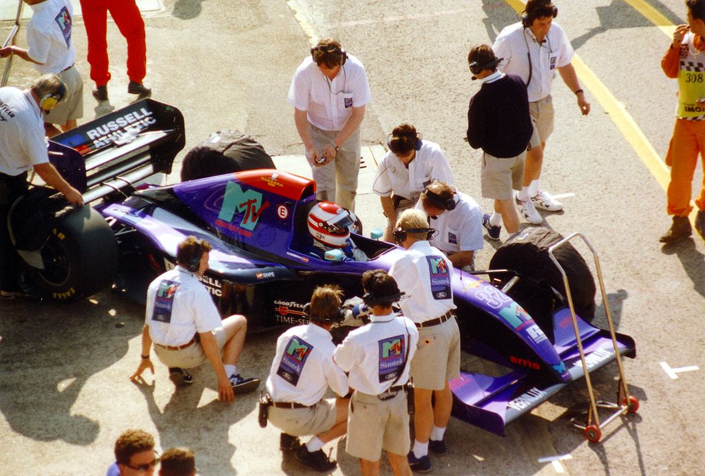Roland Ratzenberger surrounded by people