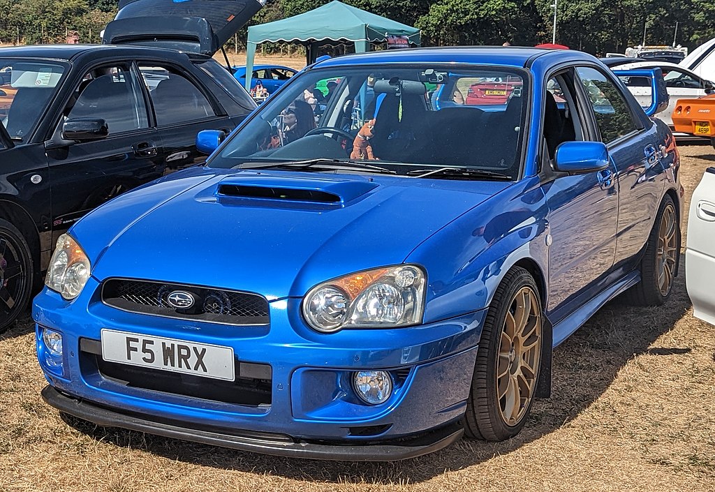 Close Up Photo of blue Subaru Impreza WRX 2003